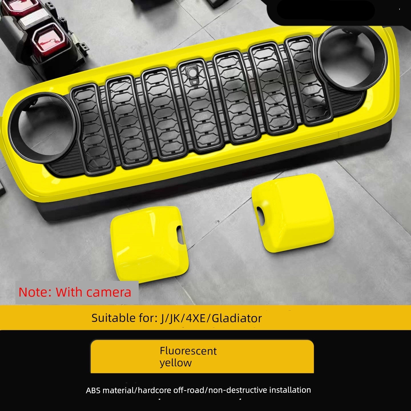 Yellow and black bumper for off-road vehicles on a gray floor.