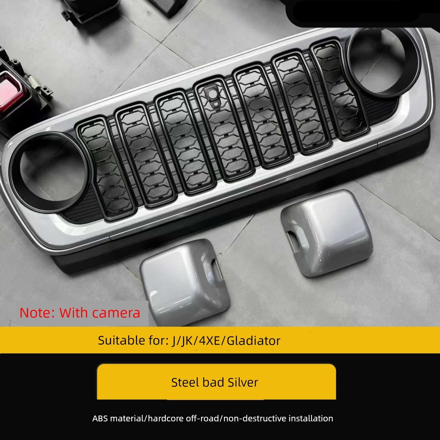 Car grille and bumper set on a gray surface with branding text.